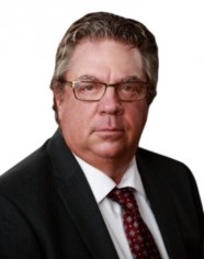Keith E.